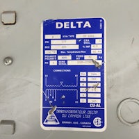 a delta control panel with a label on it